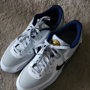 Nike White and Navy Sneakers with Gold Accents